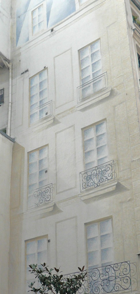 Paris trompe l'oeil windows on blind wall